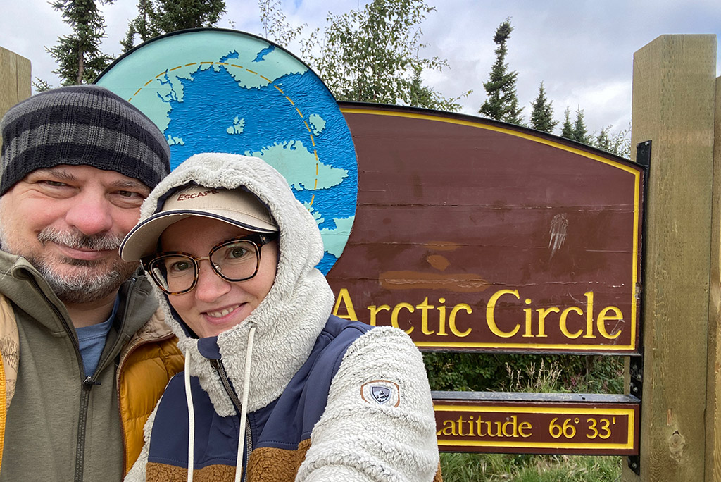 Agnes and Chris on the Arctic Circle campground on Dalton Highway Alaska.