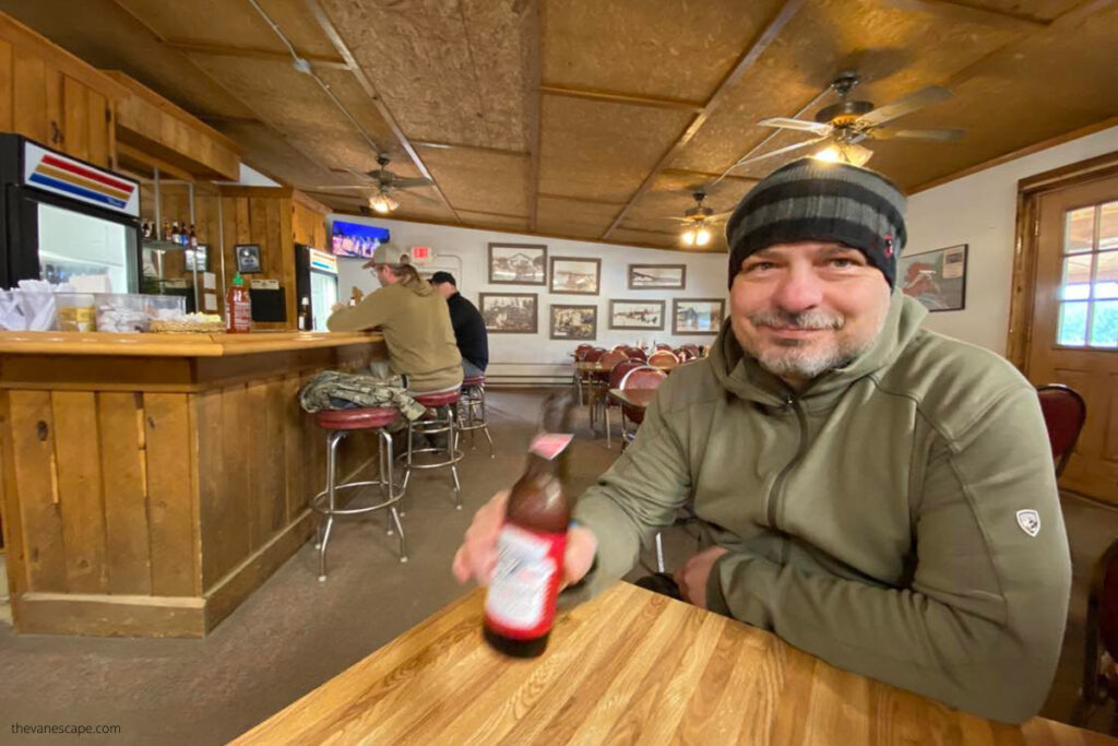 Chris dringing beer in the Northern Most Saloon in the USA.