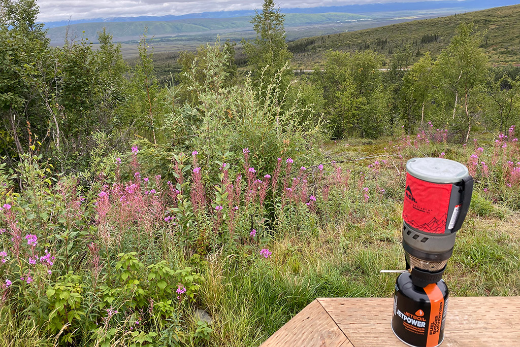 Making a coffee during camping along the Dalton Highway.