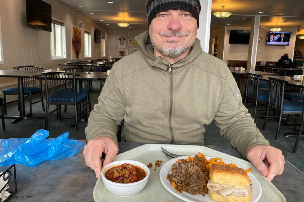 Deadhorse at Prudhoe Bay - Chris eating lunch in one of the industrial hotels.