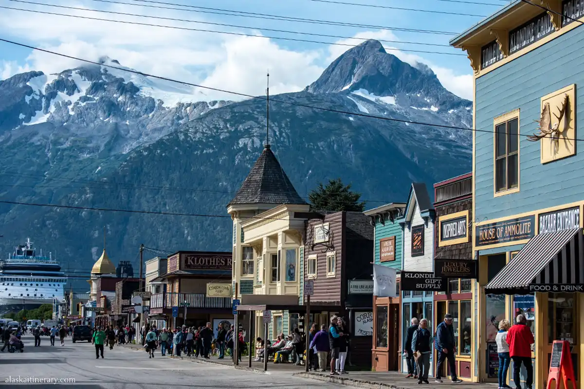 our morning walk in historical Skagway - colorful wooden buildings, mountains in the backdrop.