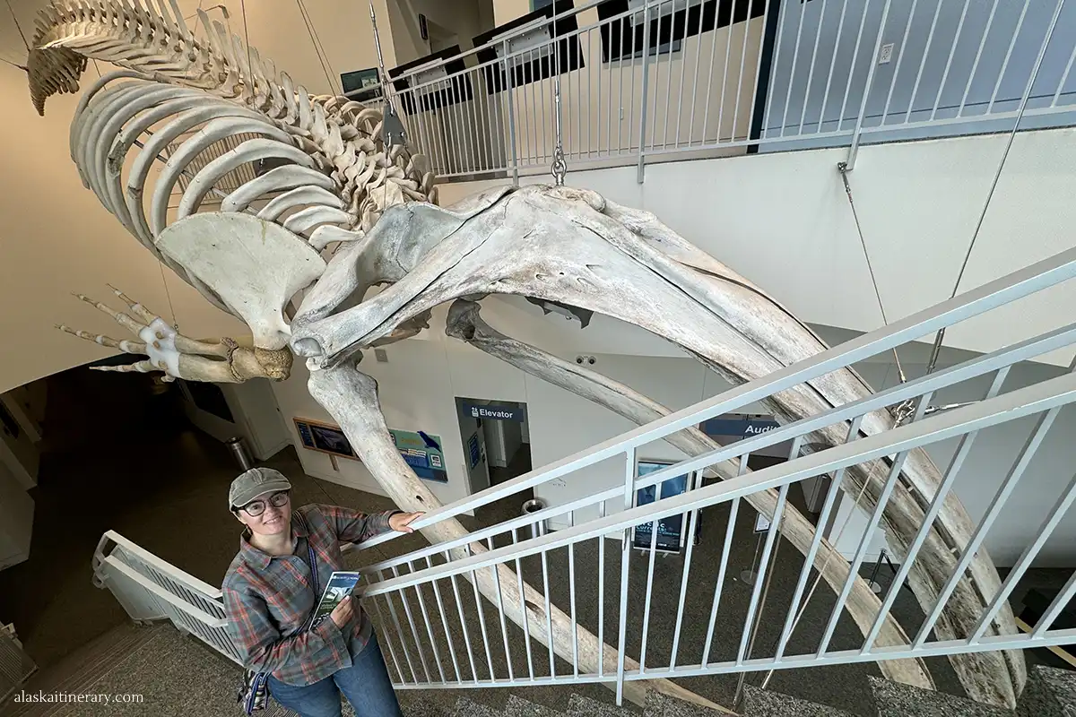 Agnes Stabinska, the author, next to huge skelton in the Museum of the North in Fairbanks.