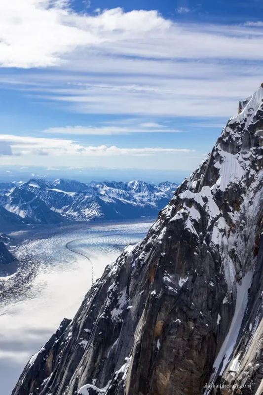 Scenic flight over Denali with glacier landing in summer.