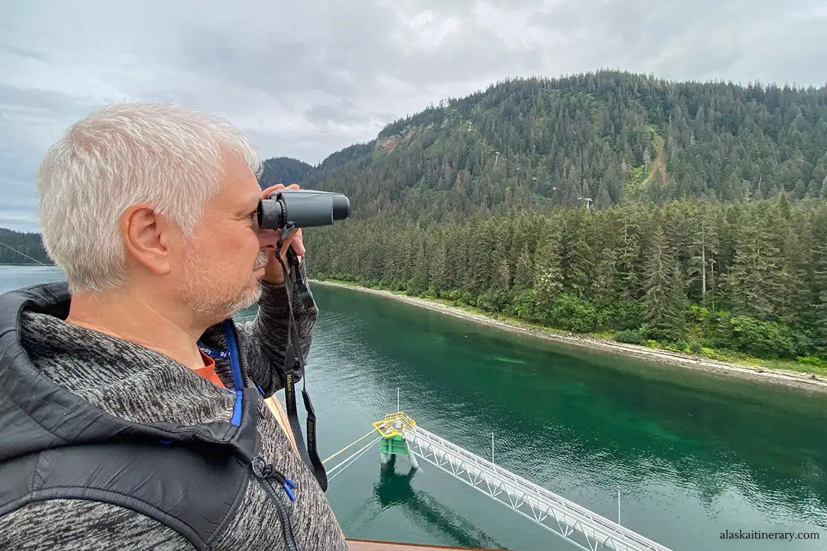 Chris using binoculars during Alaska cruise.
