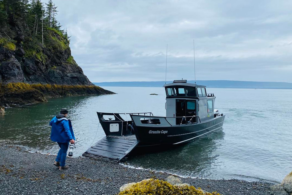 Chris, and a boat, during our wildlife tour in Katchemak Bay.