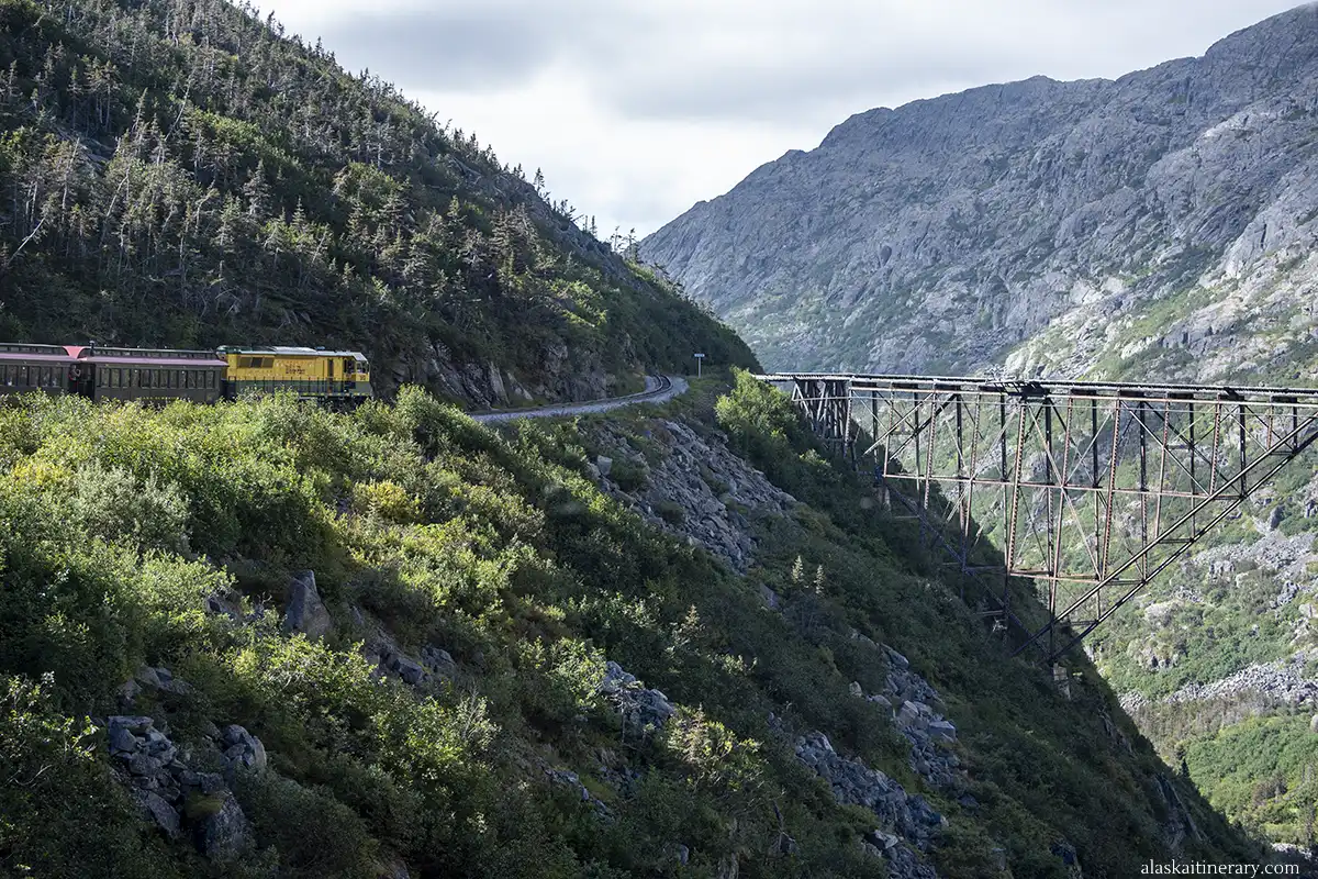 White Pass Scenic Railway with old brige and mountain view.