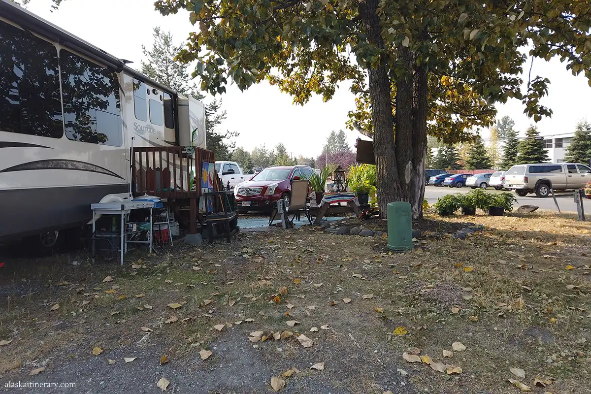 RV campground in Anchorage surronded by trees.