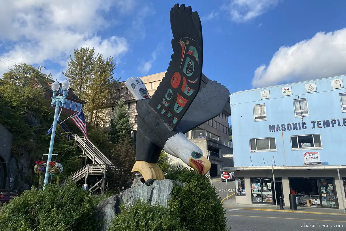A huge wooden sculpture of an eagle with spread wings painted in Indian patterns in downtown Ketchikan.