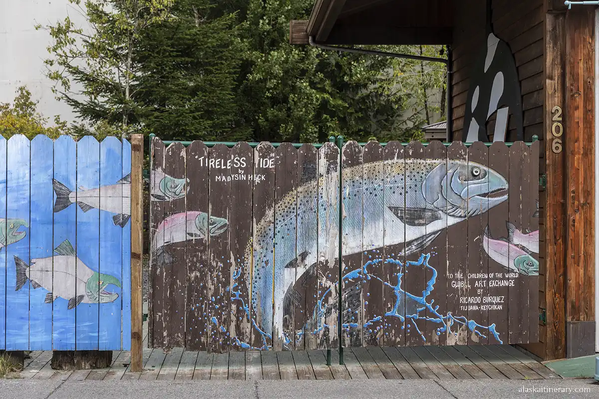Mural in Ketchikan with colorful salmon.