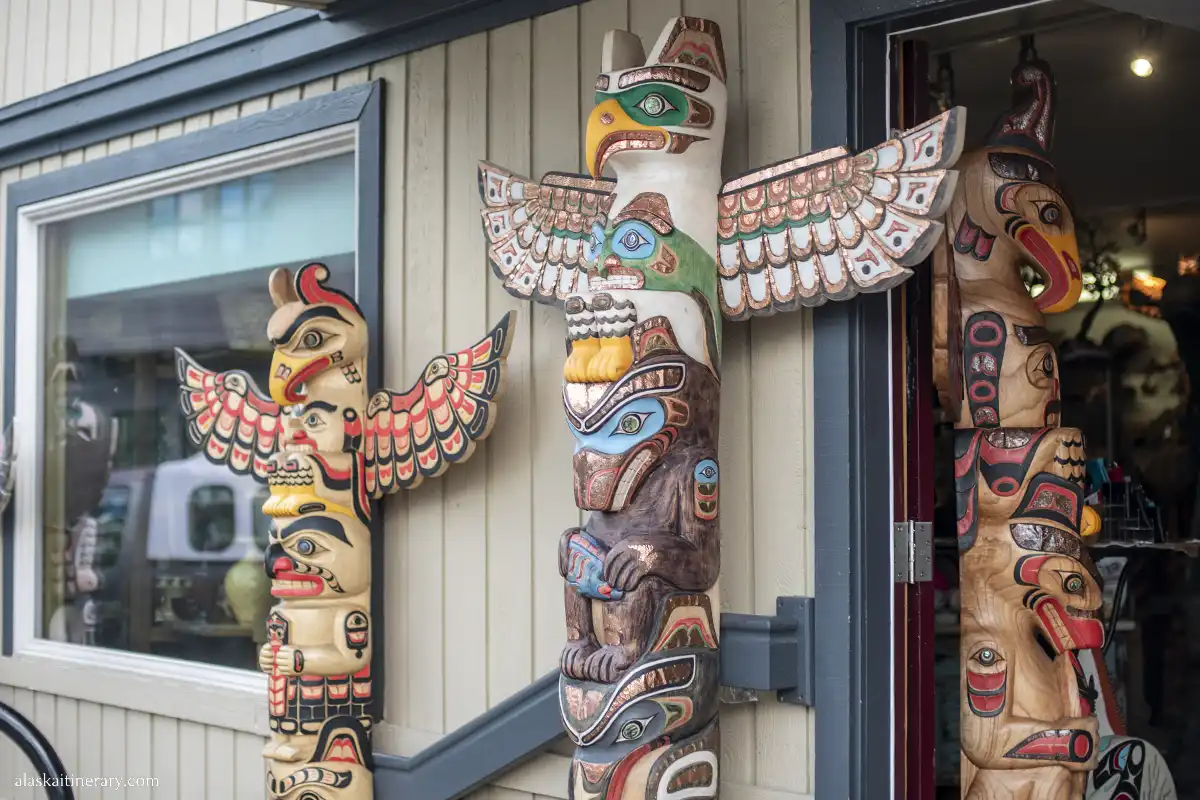 intricately carved and colorful totem poles in Ketchikan.