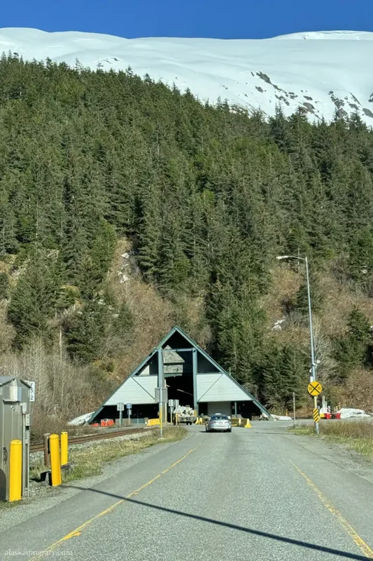 Anton Anderson Memorial Tunnel to Whititer among mountain scenery.