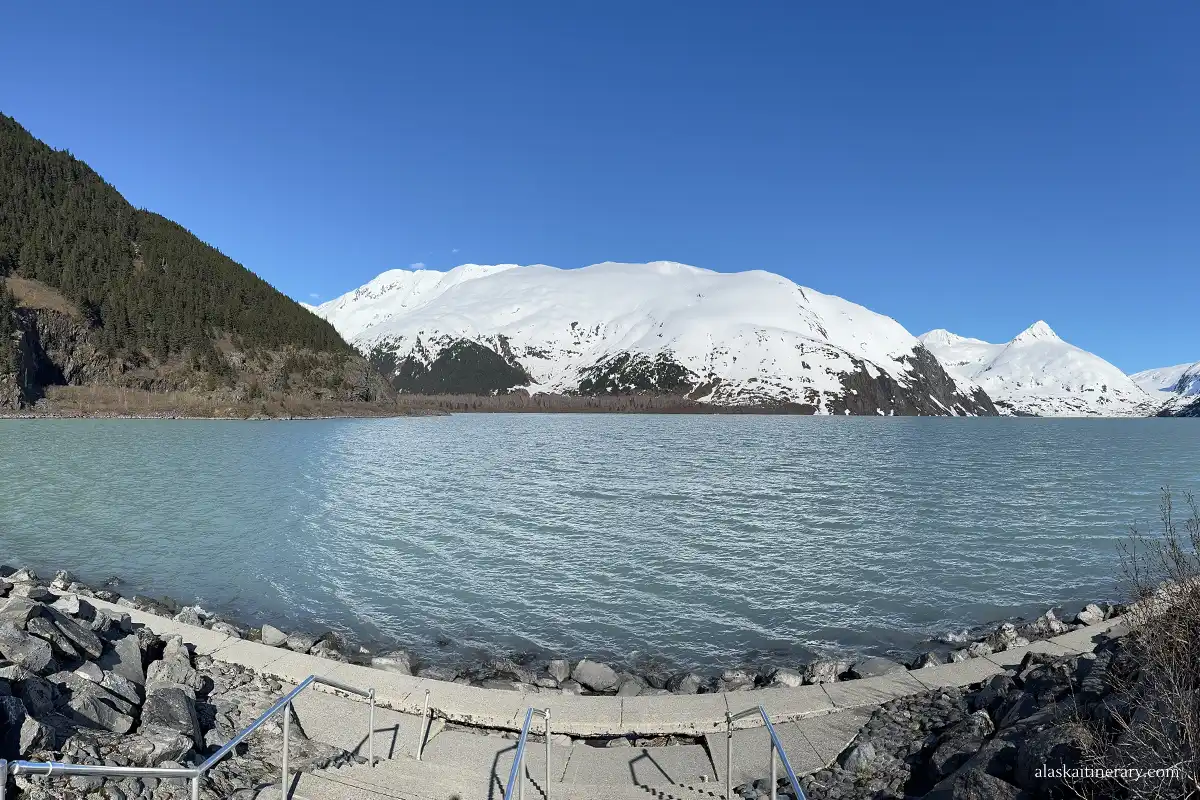 the view of Portage Lake and mountains next to Begich Boggs Visitor Center.