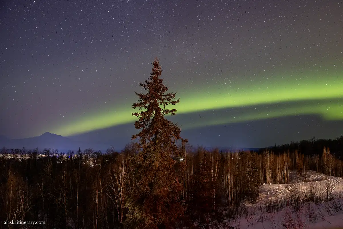 Northern lights with Denali peak in the backdrop from Talkeetna.