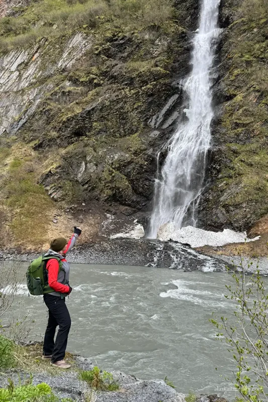 Agnes Stabinska, the author, next to Bridal Veil Falls in Valdez.