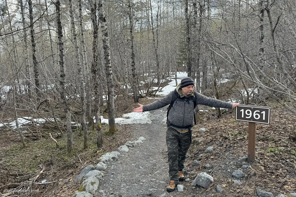 Chris on Exit Glacier trail, where markers showing where Exit Glacier once extended in 1961.