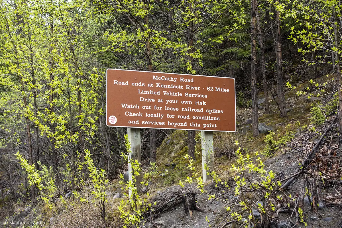 The sign at the entrance to the McCarthy road: limited vehicle services, drive at your own risk.