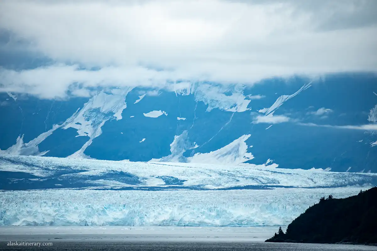 Scenic Hubbard Glacier with mountains in the backdrop.